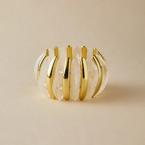 Handmade chunky elastic bracelet with alternating gold metal and milky white resin links