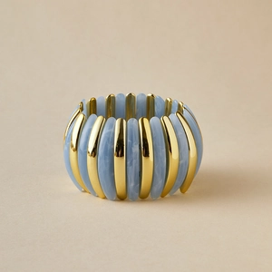 Maillard style acrylic and gold elastic bracelet with blue marble and metal vertical bars