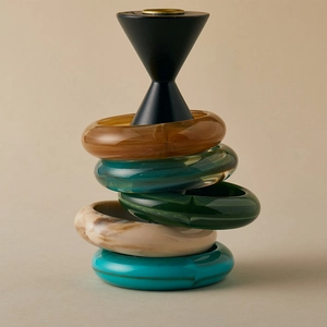 Close-up of retro acrylic bangles with tortoiseshell patterns and marble textures