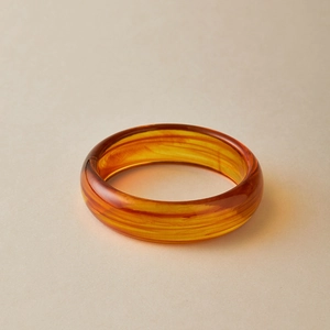 Bohemian amber acrylic bangle with elegant marble texture and polished semi-round finish