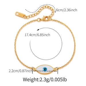 Detailed view of evil eye bracelet in gold stainless steel with lobster clasp and chain