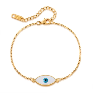 Detailed view of gold stainless steel bracelet with blue evil eye charm and lobster clasp