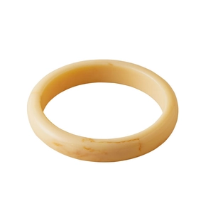 Detailed view of the marbled cream acrylic resin texture on this vintage geometric bangle
