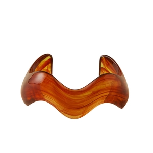 Amber wave resin open cuff bracelet with stylish marble texture on white background