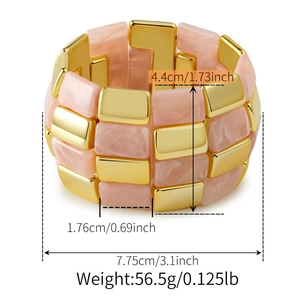 Detailed view of wide marble resin and gold metal bracelet with size specifications