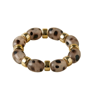 Elastic beaded bracelet featuring leopard print resin beads and gold-toned metal spacers