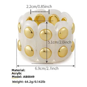Detail showing acrylic bracelet dimensions and gold-tone stud accents on white links