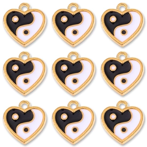 Macro view of nine heart-shaped Yin Yang enamel pendants for DIY jewelry making
