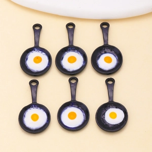 Set of six mini black frying pan charms with fried egg detail for DIY jewelry making