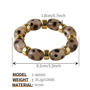 Detail view of leopard print acrylic beads with 1.8cm diameter and elastic cord fit