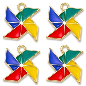 Macro detail of four colorful enamel windmill charms in gold finish for DIY jewelry