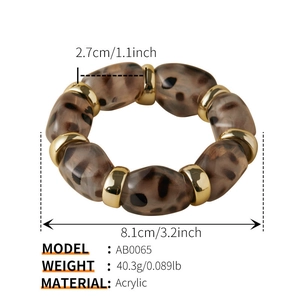 Detail view of leopard print acrylic beads with product dimensions and 40.3g weight