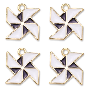 Detail of four blue and white enamel windmill charms for DIY jewelry making