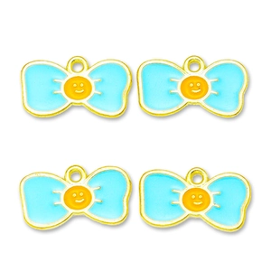 Detail of four light blue enamel bow pendants with orange smiley faces and metal rings