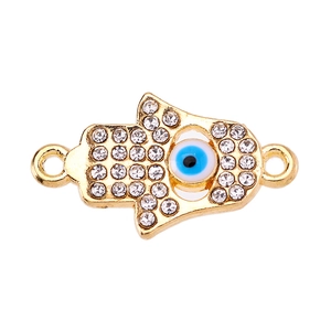 Detailed view of a gold-plated Hamsa Hand connector with pavé crystals and blue evil eye