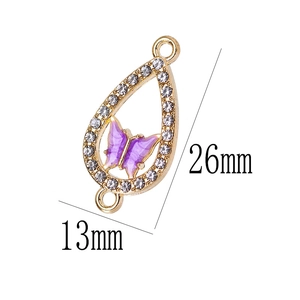 Conector colgante de mariposa dorada con alas púrpuras y circonitas blancas, 26mm