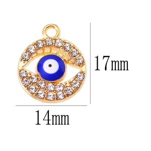 Gold-plated Evil Eye pendant with clear crystals and blue enamel detail, 17mm x 14mm