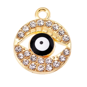 Detail view of gold Evil Eye pendant featuring sparkling rhinestones and enamel inlay