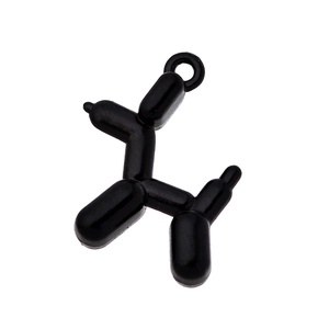 Detail shot of a glossy black balloon dog pendant with a sturdy metal ring attachment