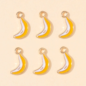 Detailed view of six miniature yellow enamel banana pendants for DIY jewelry crafting
