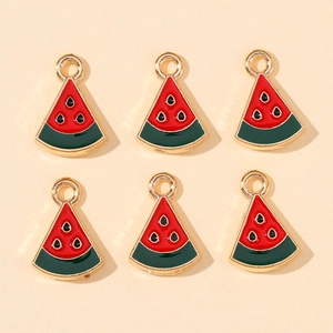 Detail of six watermelon slice charms with gold edges for DIY earring jewelry making