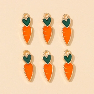 Set of six orange carrot charms with green leaf accents for DIY jewelry making