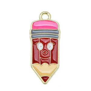 Macro detail of cartoon pencil charm with colorful enamel inlay and golden alloy edges