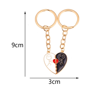 Creative metal heart puzzle keychain for couples in black and white finish, 9cm length