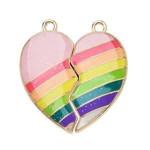 Macro view of magnetic heart-shaped friendship pendants with colorful glitter enamel finish