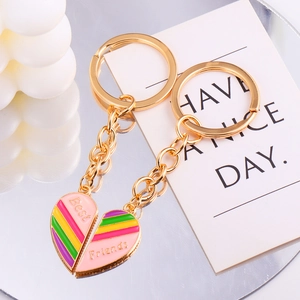 Detailed view of rainbow enamel heart-shaped Best Friends matching keychains