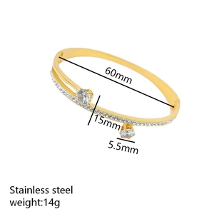 Gold stainless steel double-layered bangle with a heart-shaped zircon pendant