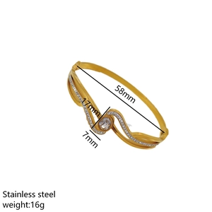 Minimalistischer goldener Edelstahl-Armreif mit großem Zirkon und Wellen-Design