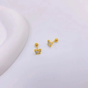 Detail view of 18K gold butterfly earrings with shell inlay and screw ball backings