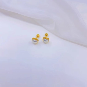 Elegant gold heart stud earrings with white pearl inlay and secure screw back closure