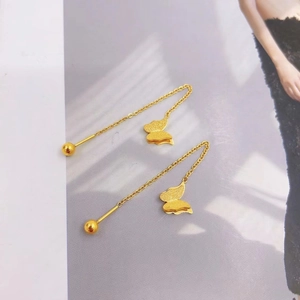 Elegant gold butterfly tassel earrings featuring screw ball backs for a secure fit