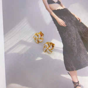 Elegant 18K gold-plated rotating windmill stud earrings with sparkling pavé zircons