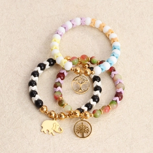 Driedelige Boheemse kralenarmbandset met levensboom en olifant hangers