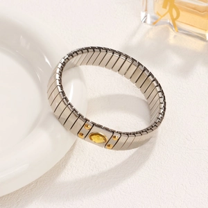 Elastic stainless steel bracelet with silver stretch band and yellow gemstone focal point