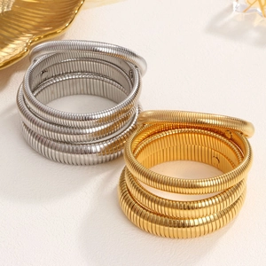 Juego de pulseras elásticas de acero de titanio en acabado dorado y plateado
