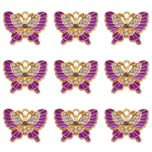 Detailed set of 9 purple enamel butterfly charms with gold metal edges and rhinestones