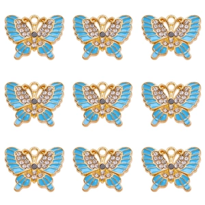 Detailed grid of blue enamel butterfly charms with crystal inlay for DIY jewelry making