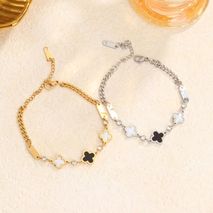 Elegante 18k Gold und Silber Kleeblatt Armbänder mit schwarzen und weißen Steinen