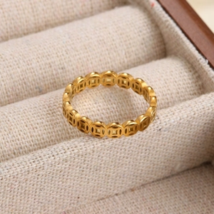 Titanium steel ring with gold-plated Chinese lucky coin hollow design on linen box