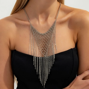 Detail of silver layered chain mesh fringe necklace with heavy metal punk tassel design