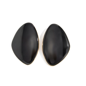 Detail of black resin oval stud earrings with irregular gold plated metal borders
