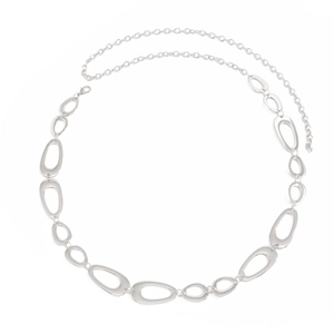Detail of silver hollow oval metal links on waist chain with lobster clasp and extension