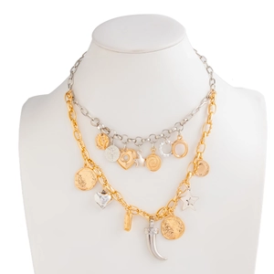 Two-tier mixed metal layered necklace with star, heart and coin charms on a model display