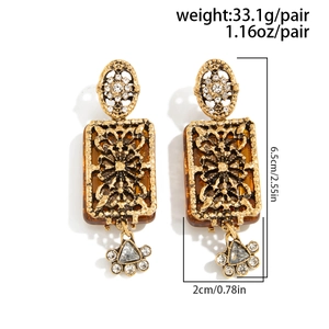 Détails des boucles d'oreilles fleurs dorées vintage avec dimensions et poids
