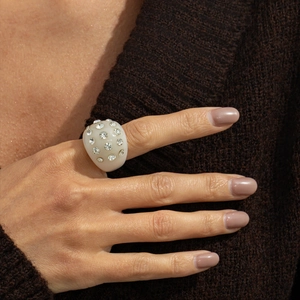 Retro cream white resin ring with shimmering rhinestones in a vintage aesthetic style