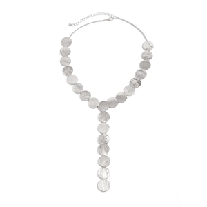 Detailed view of silver Y-shaped necklace featuring brushed metallic round discs and lobster clasp